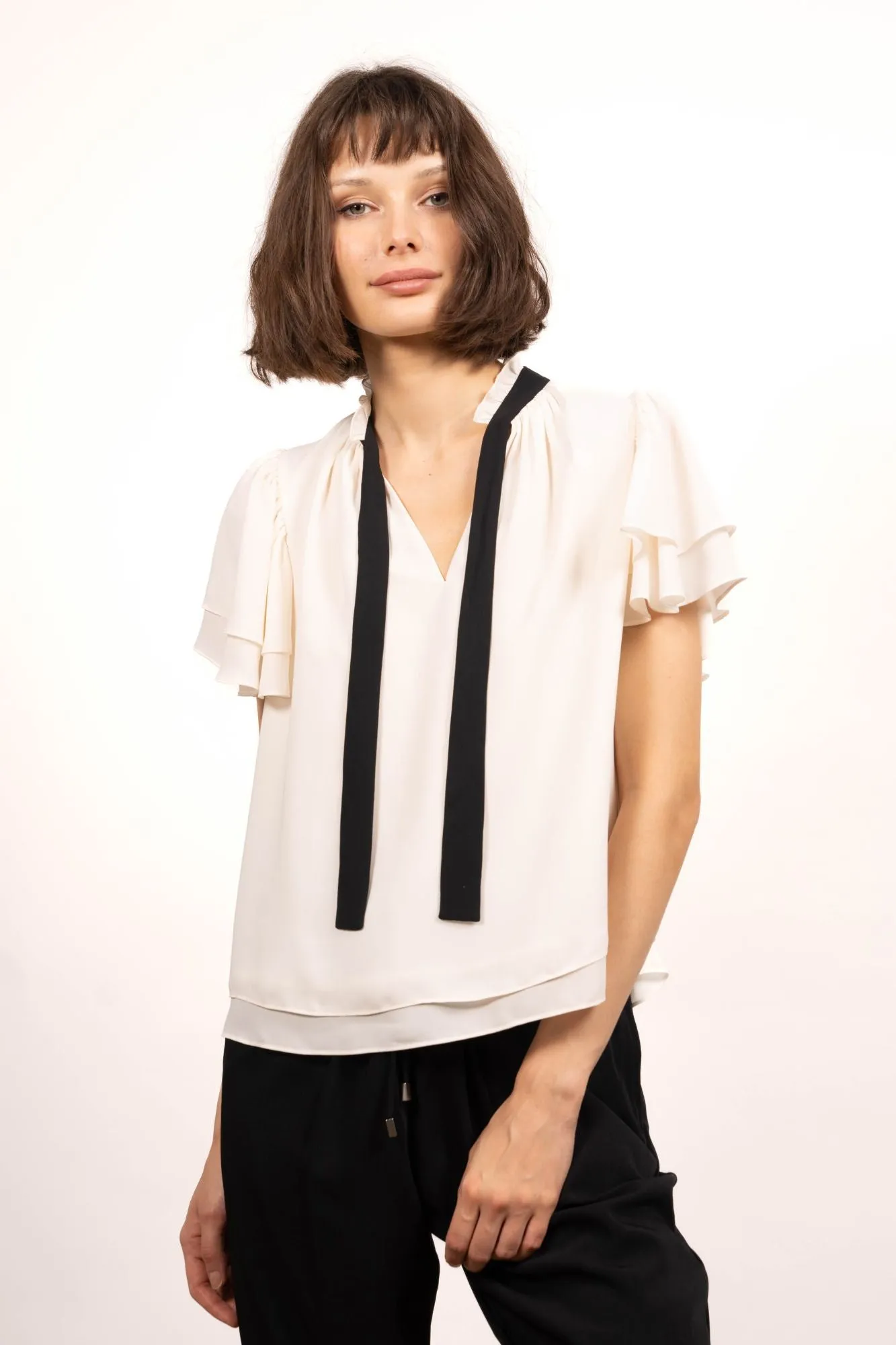 Lanna Two Layers Top With Ruffled Neck Print sold by Central Park West