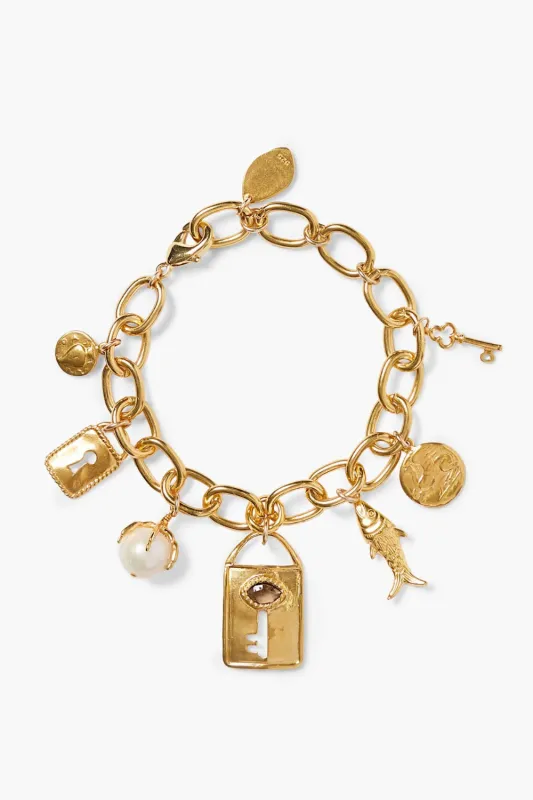 Lock and Key Charm Bracelet Gold sold by Chan Luu