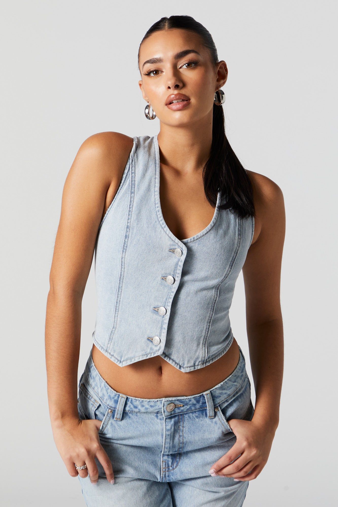 Light Wash Denim Button-Up Vest sold by Charlotte Russe