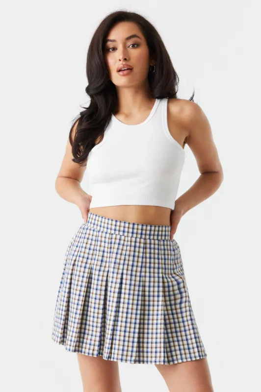 Pleated Plaid Print Twill Mini Skirt sold by Charlotte Russe