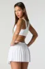 Active Pleated Side Pocket Tennis Skort sold by Charlotte Russe