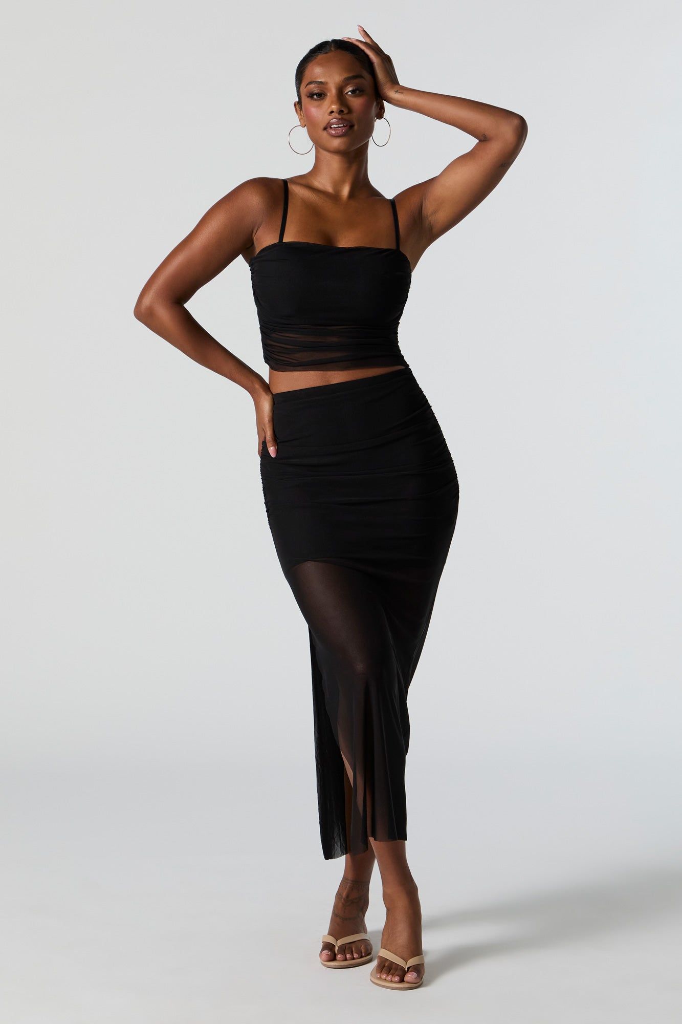 Black Mesh Ruched Midi Skirt sold by Charlotte Russe