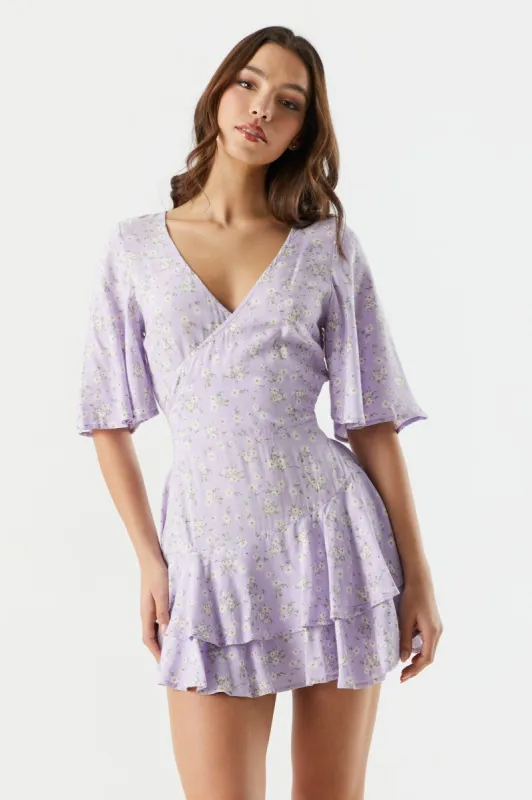 Lilac Floral Ruffle Wrap Romper sold by Charlotte Russe