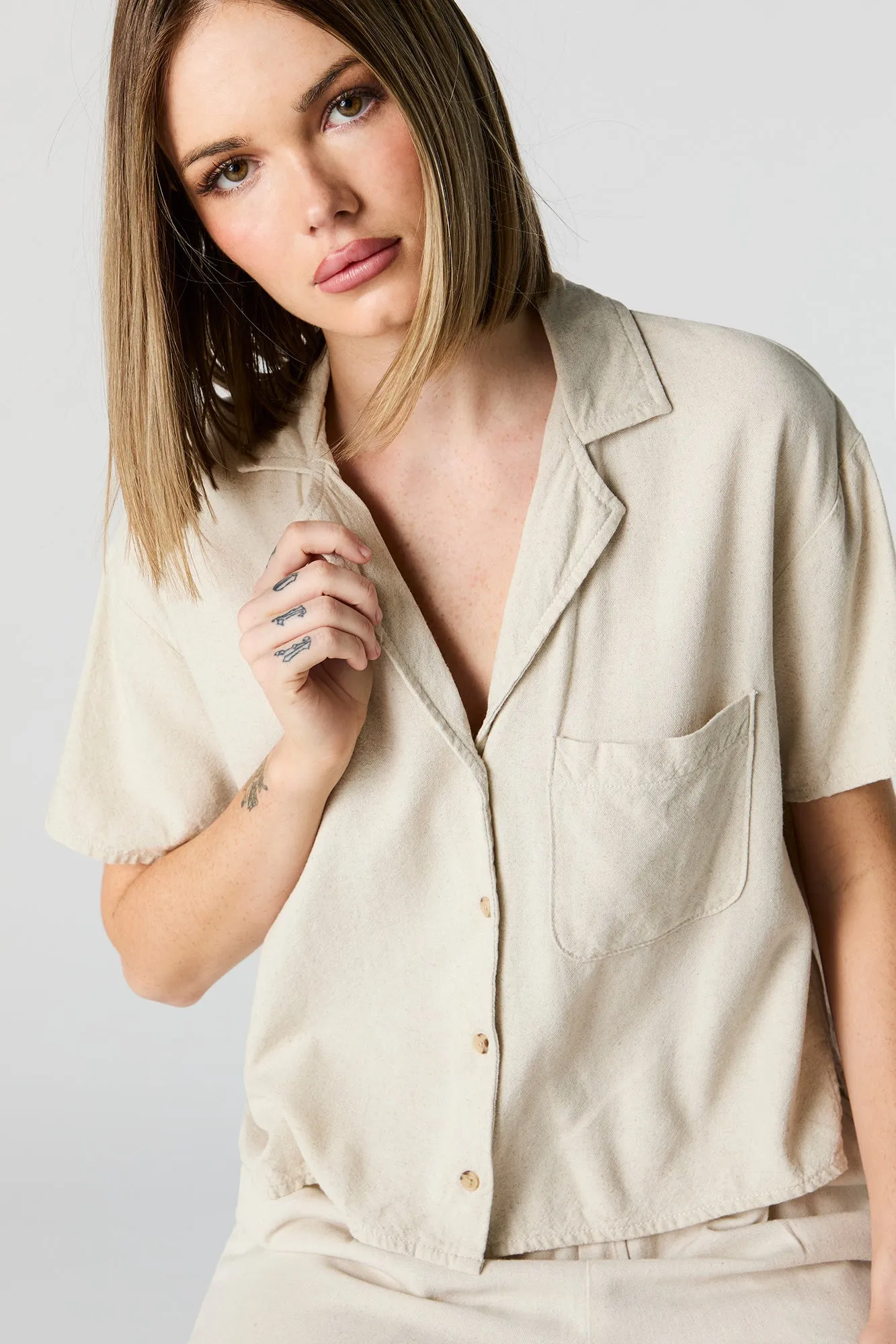 Linen Short Sleeve Button-Up Top sold by Charlotte Russe