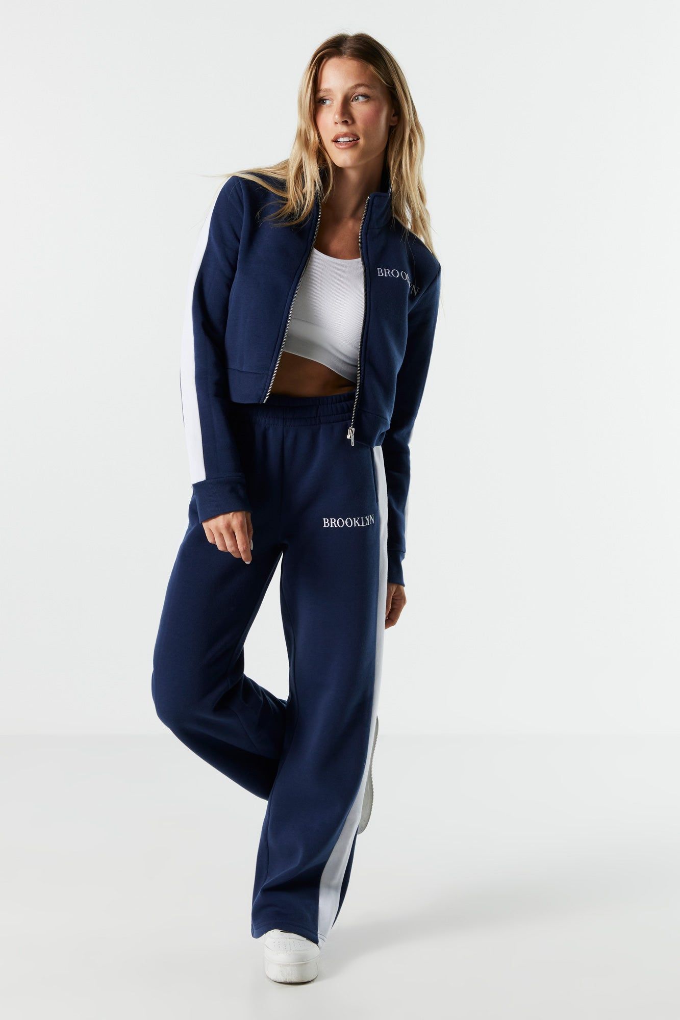 Brooklyn Embroidered Fleece Wide Leg Track Pant sold by Charlotte Russe