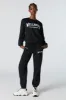Destination Embroidered Fleece Jogger sold by Charlotte Russe