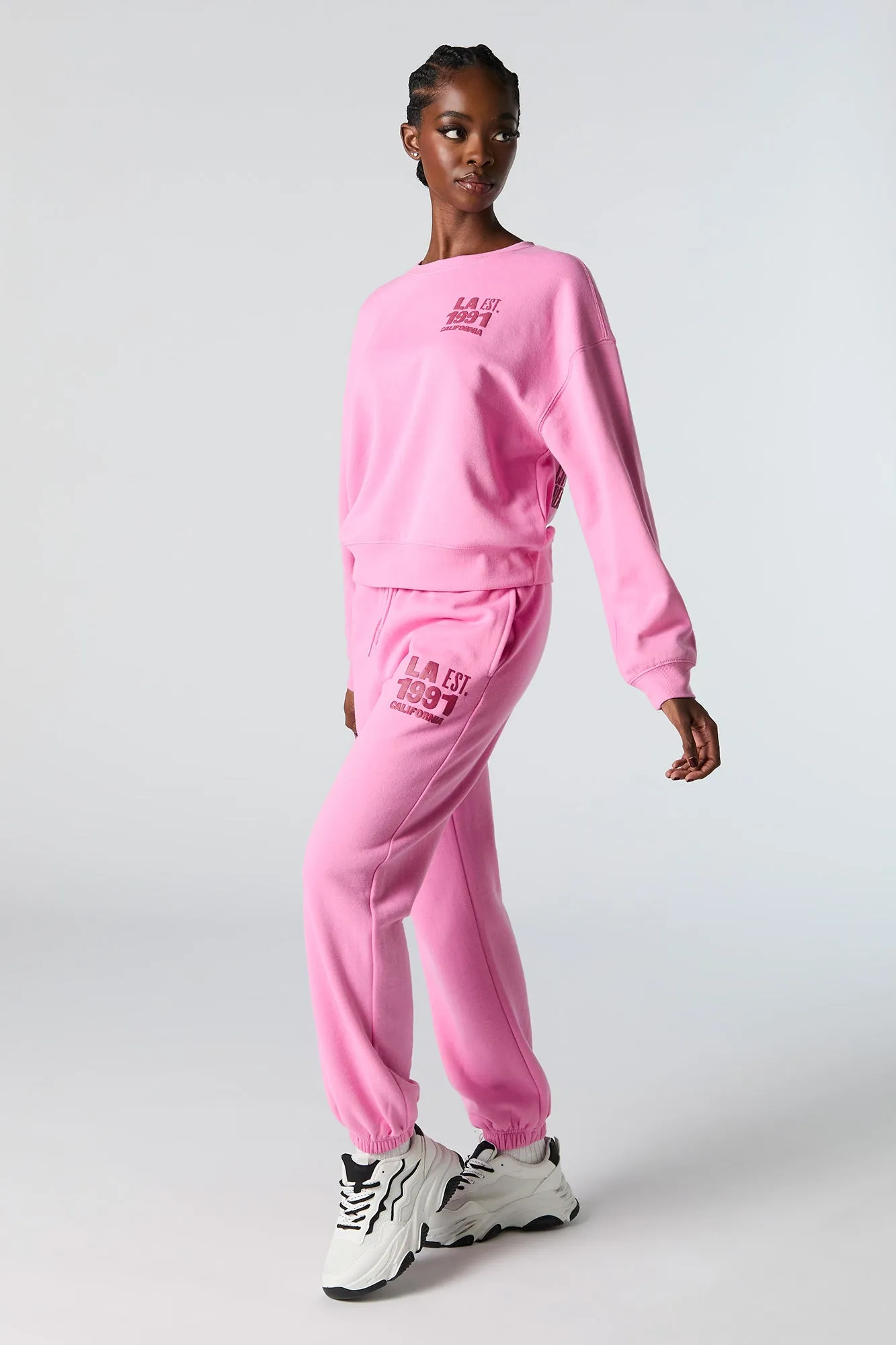 Destination Embroidered Fleece Jogger sold by Charlotte Russe