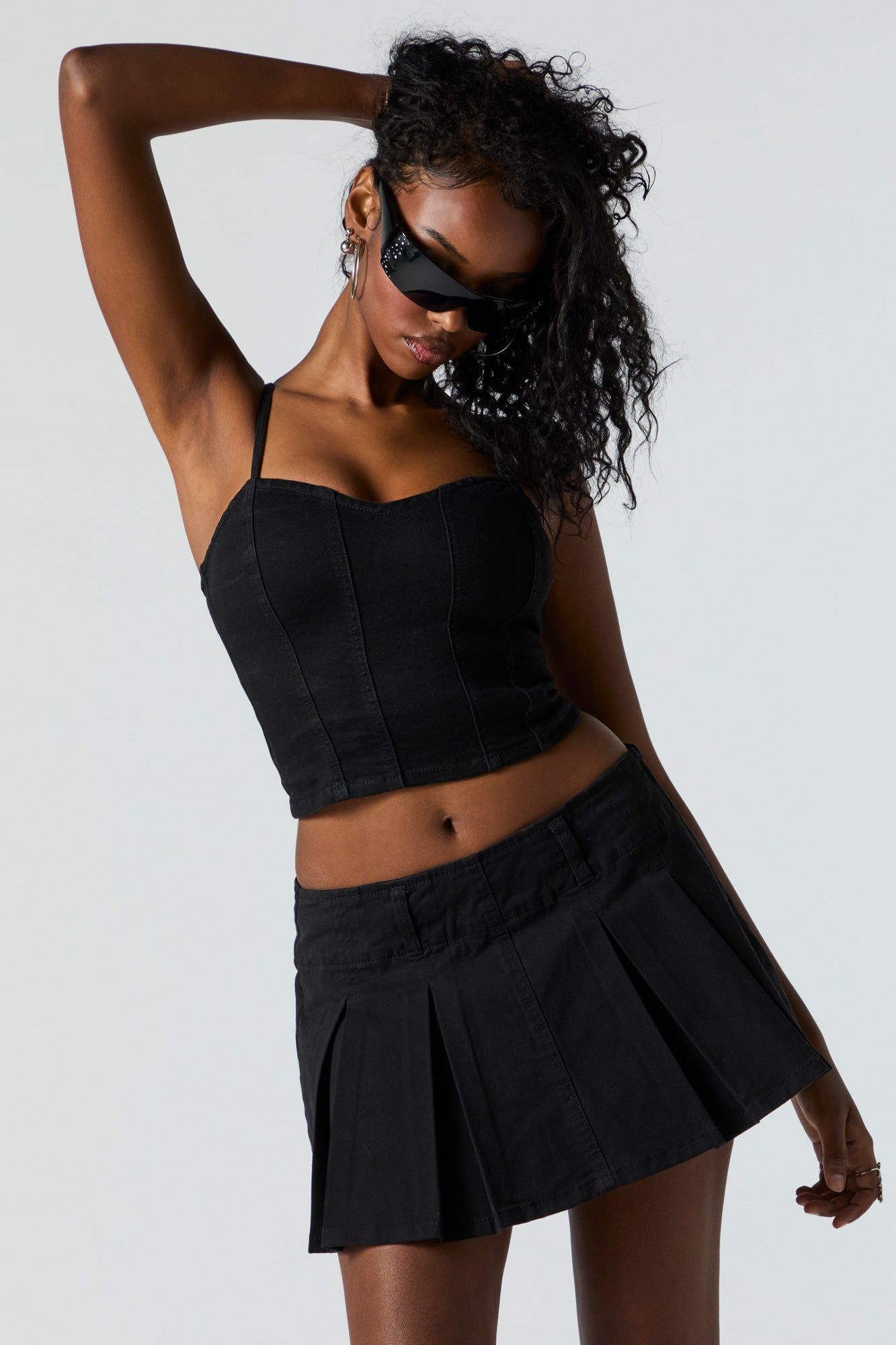 Side Zip Pleated Mini Skort sold by Charlotte Russe