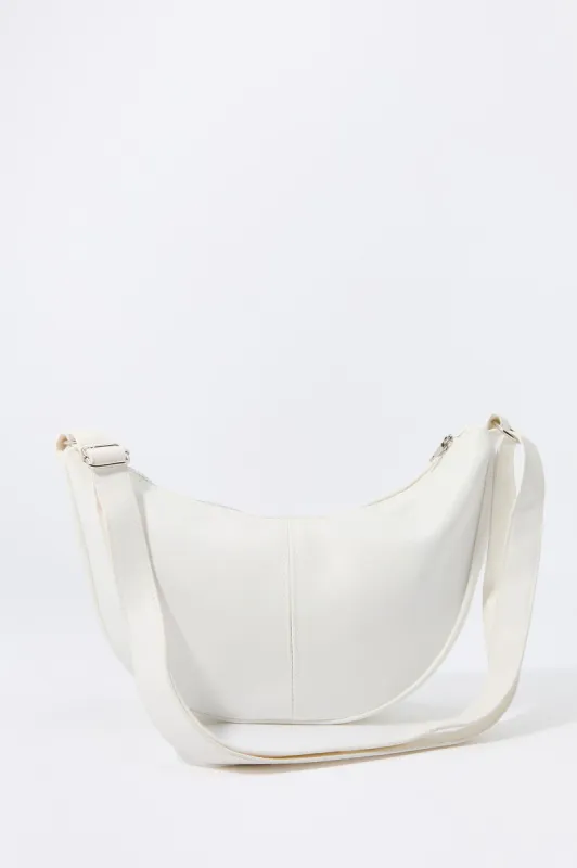 Faux Leather Half Moon Bag sold by Charlotte Russe