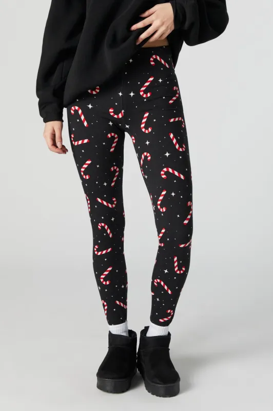 Candy Cane Print Xmas Fleece Legging sold by Charlotte Russe