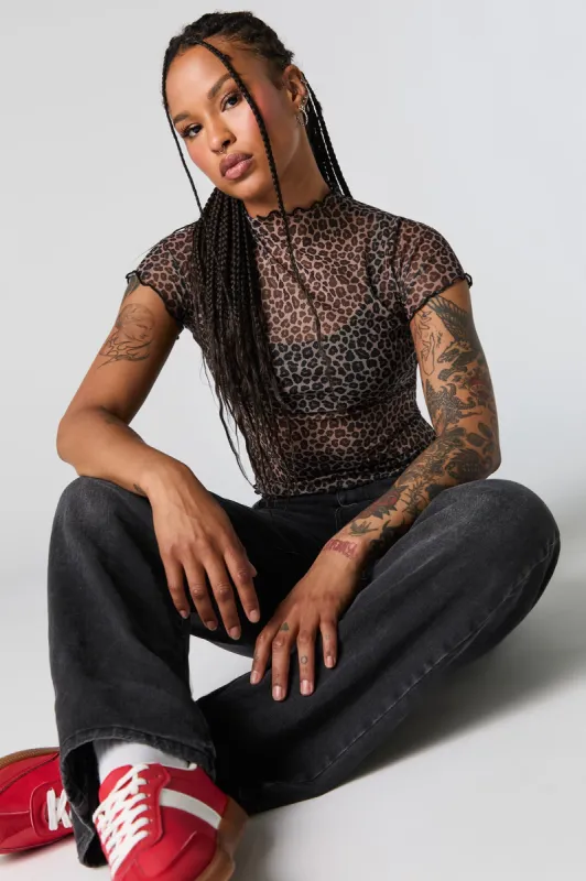 Mesh Mock Neck Lettuce Edge Crop Top sold by Charlotte Russe