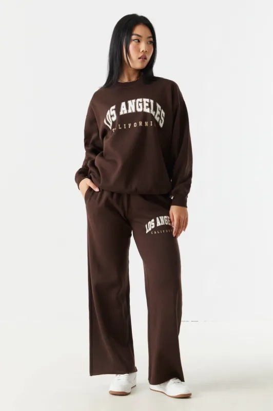 Los Angeles Graphic Wide Leg Fleece Jogger sold by Charlotte Russe