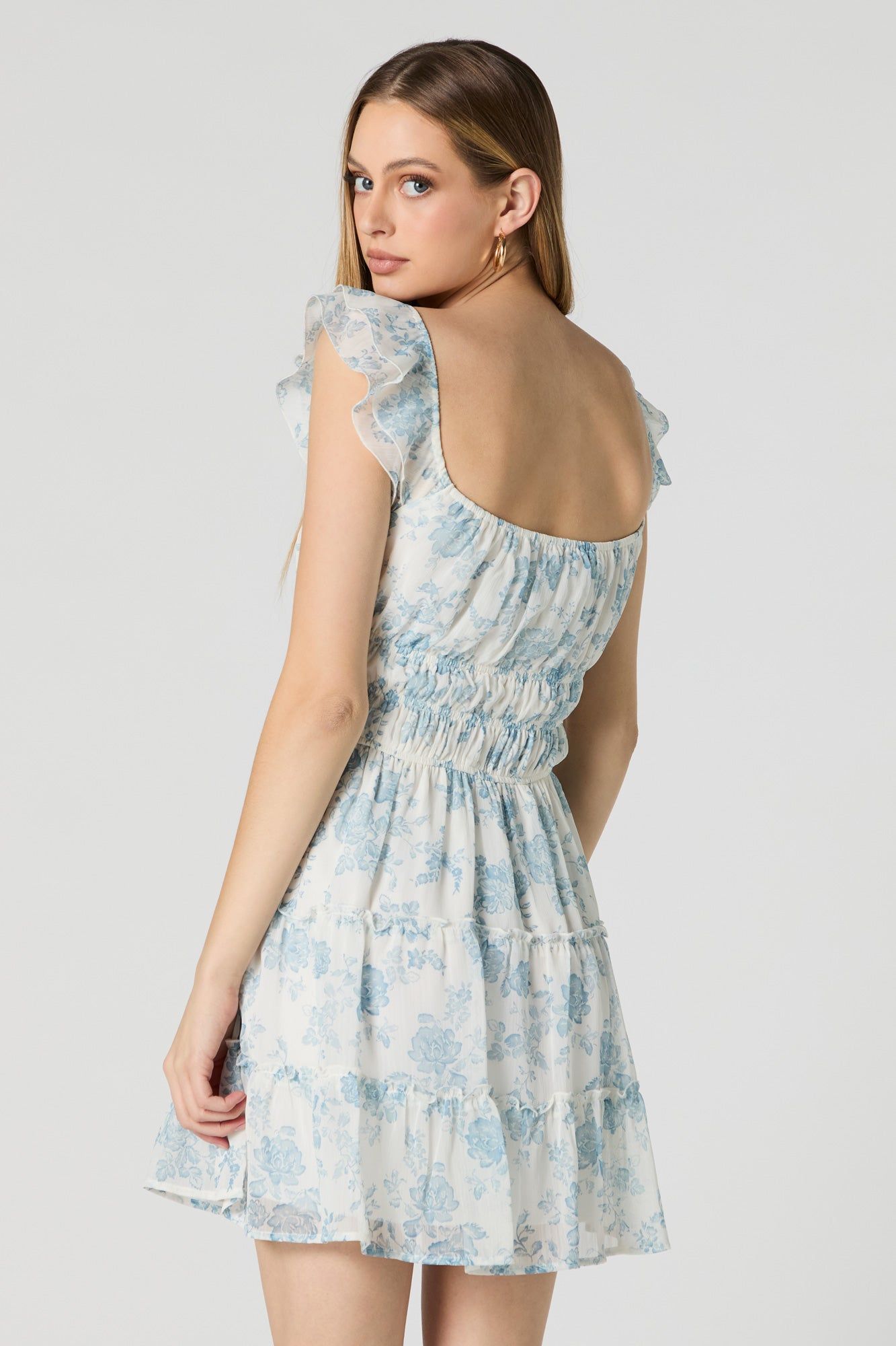 White Floral Smocked Flutter Sleeve Mini Dress sold by Charlotte Russe product image thumbnail 2