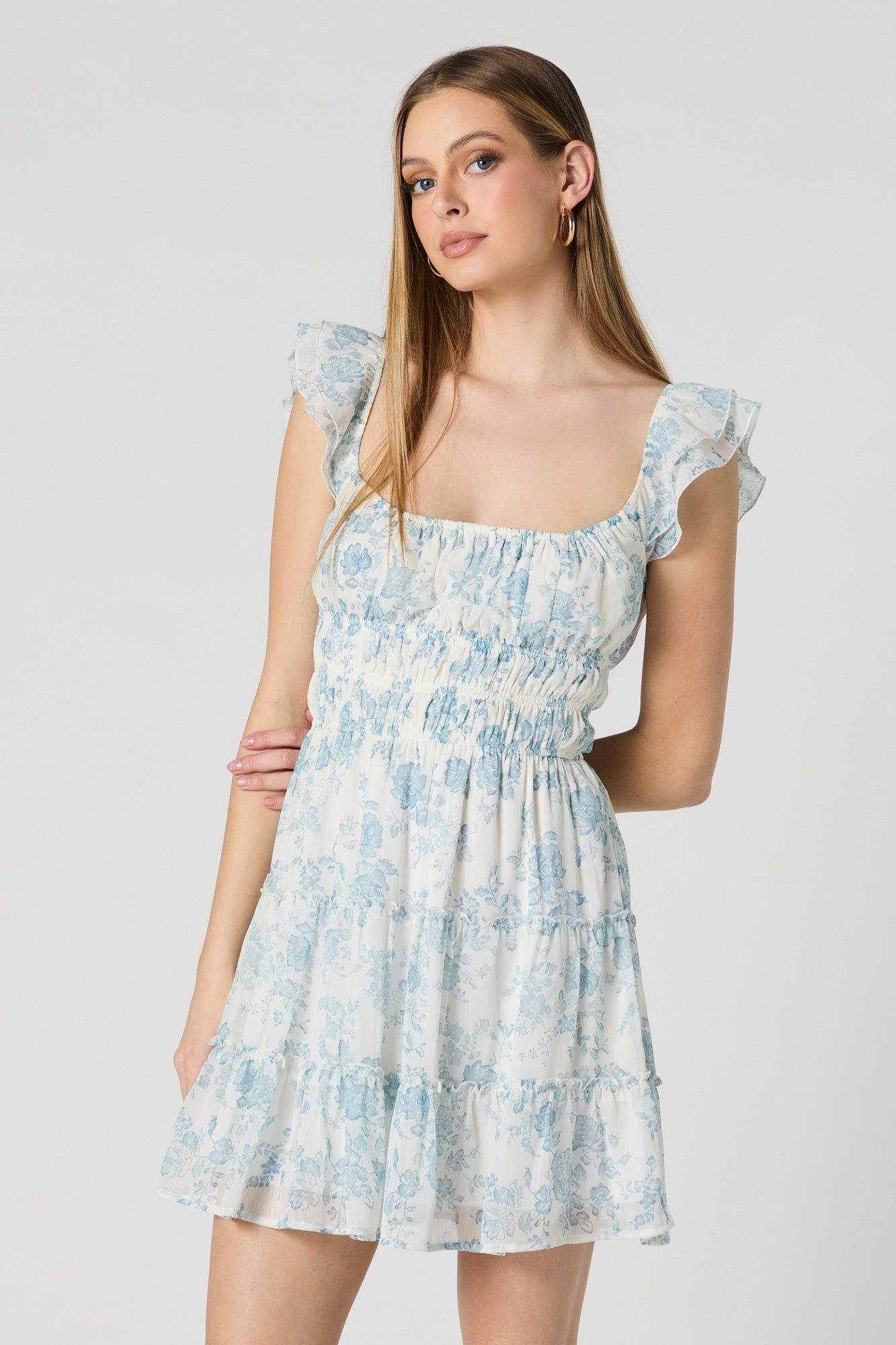 White Floral Smocked Flutter Sleeve Mini Dress sold by Charlotte Russe
