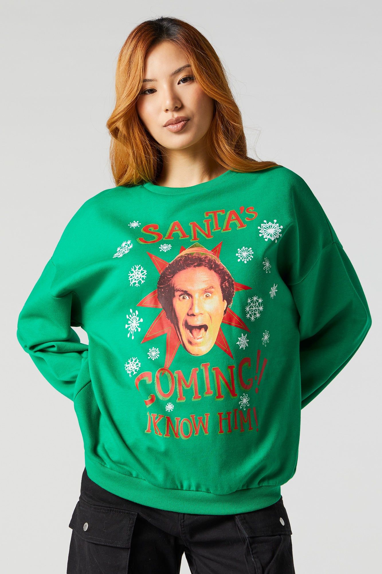 The Elf Graphic Fleece Sweatshirt sold by Charlotte Russe