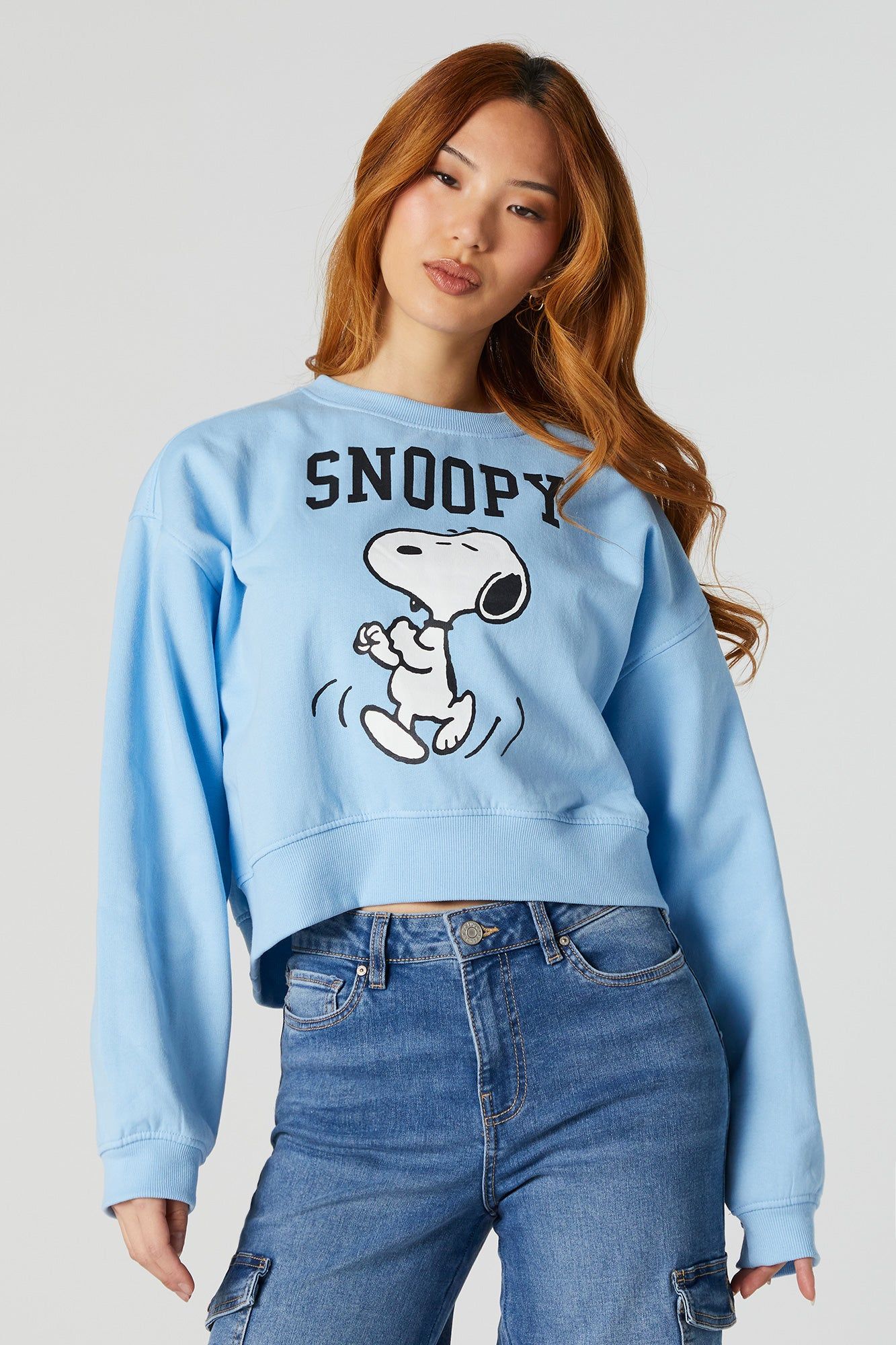 Snoopy Graphic Fleece Sweatshirt sold by Charlotte Russe