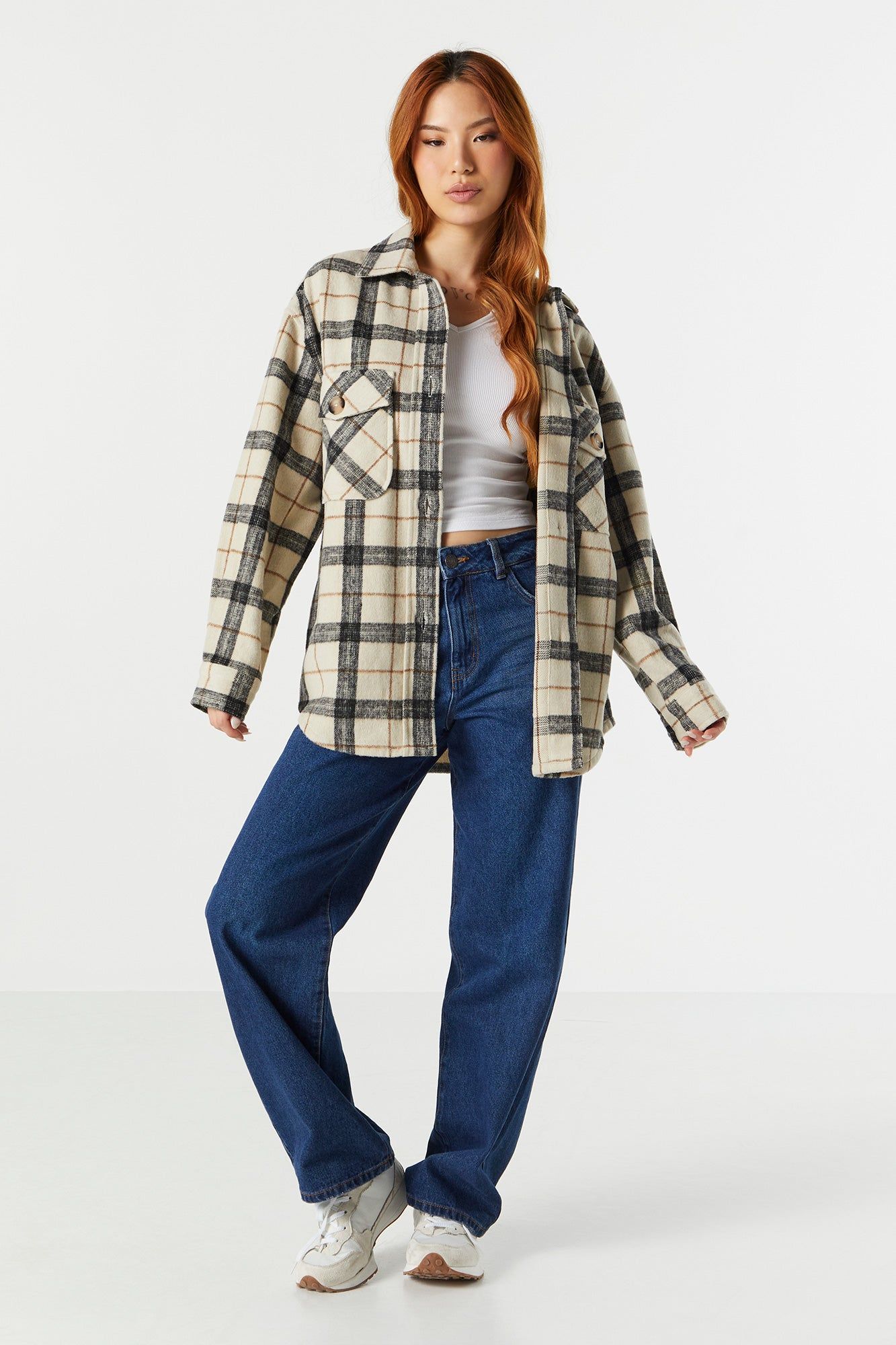 Tan Plaid Shacket sold by Charlotte Russe