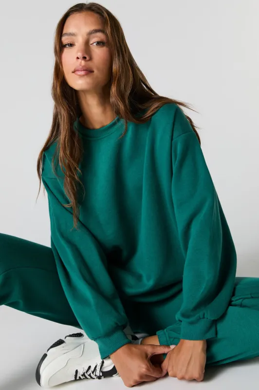Oversized Fleece Sweatshirt sold by Charlotte Russe