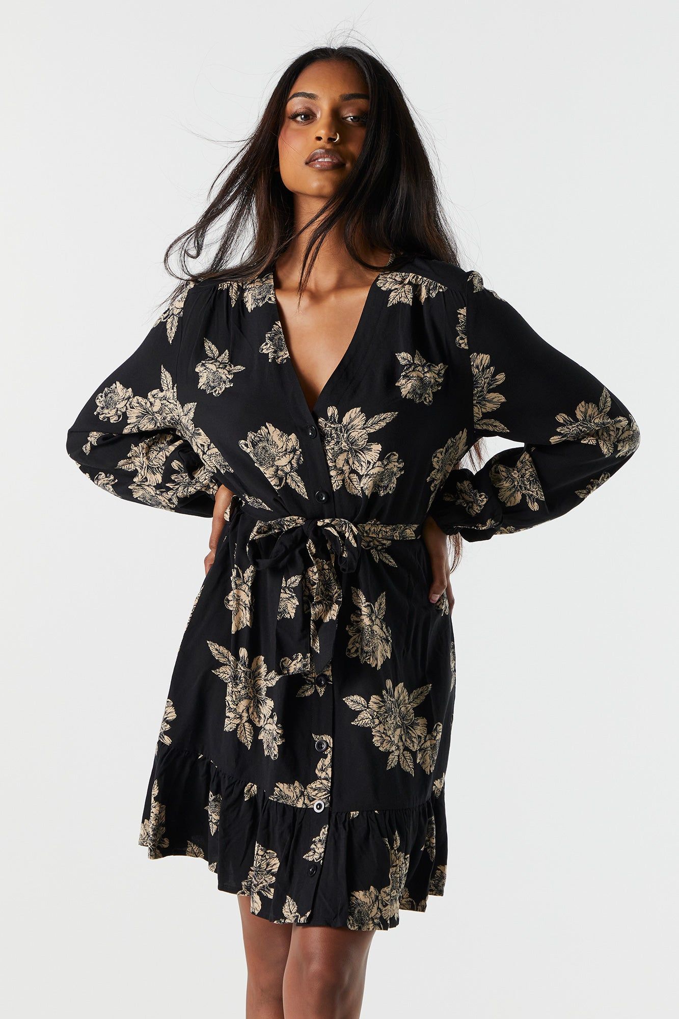 Black Floral Belted Long Sleeve Mini Dress sold by Charlotte Russe