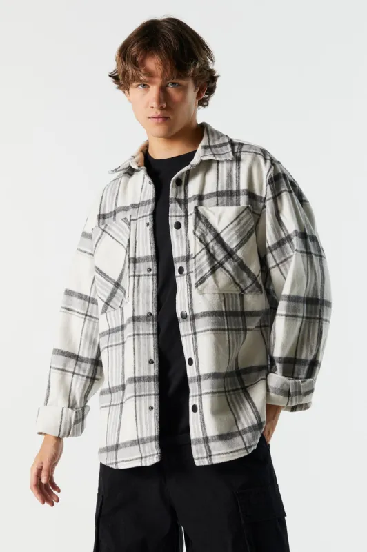Plaid Shacket sold by Charlotte Russe