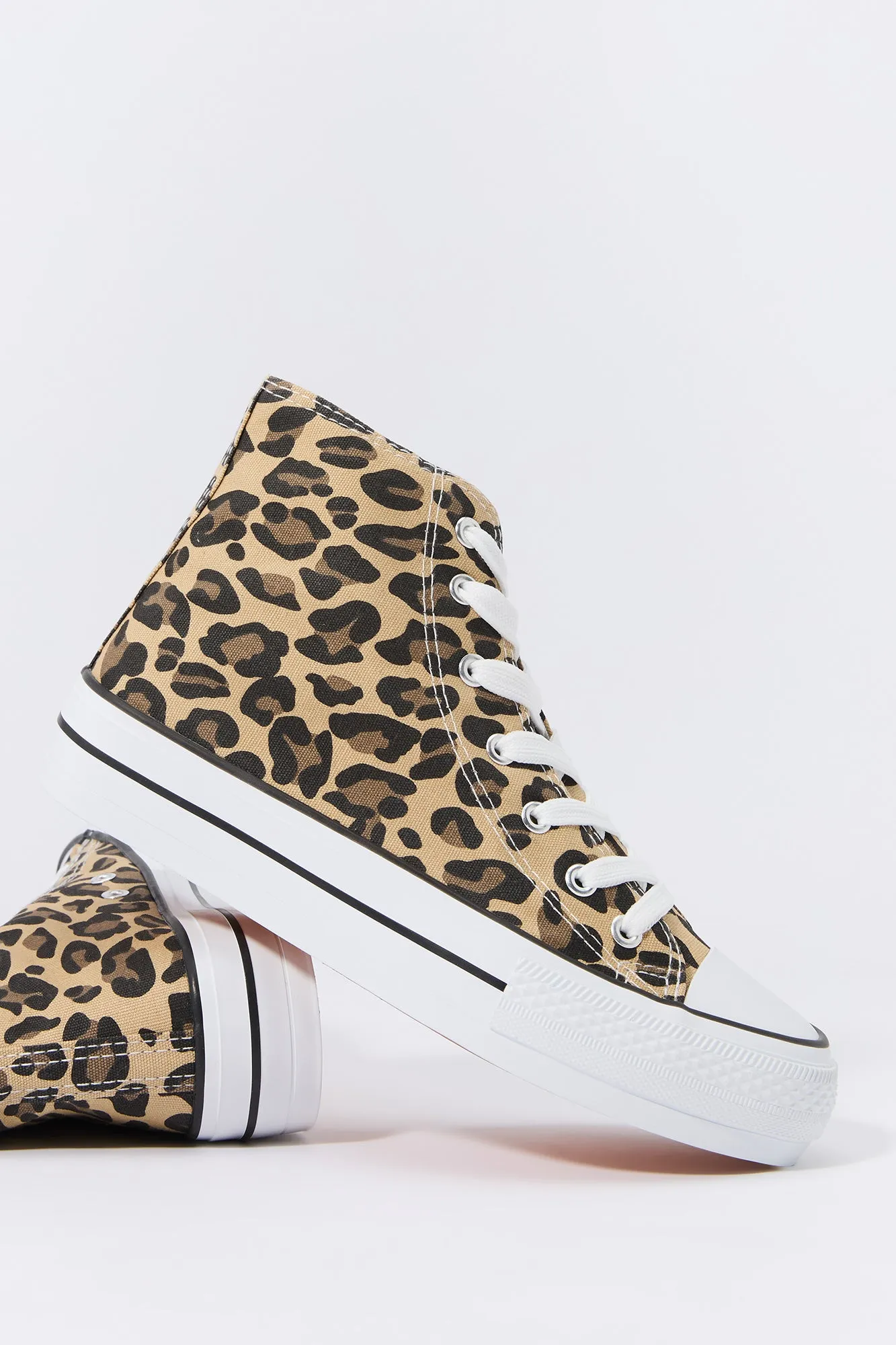 High Top Lace Up Sneaker sold by Charlotte Russe