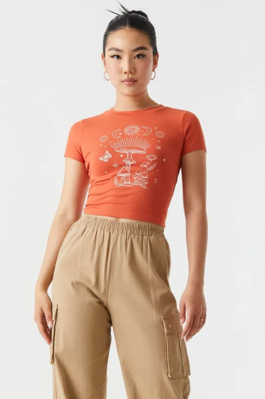 Soft Mystic Mushroom Graphic Cropped T-Shirt sold by Charlotte Russe