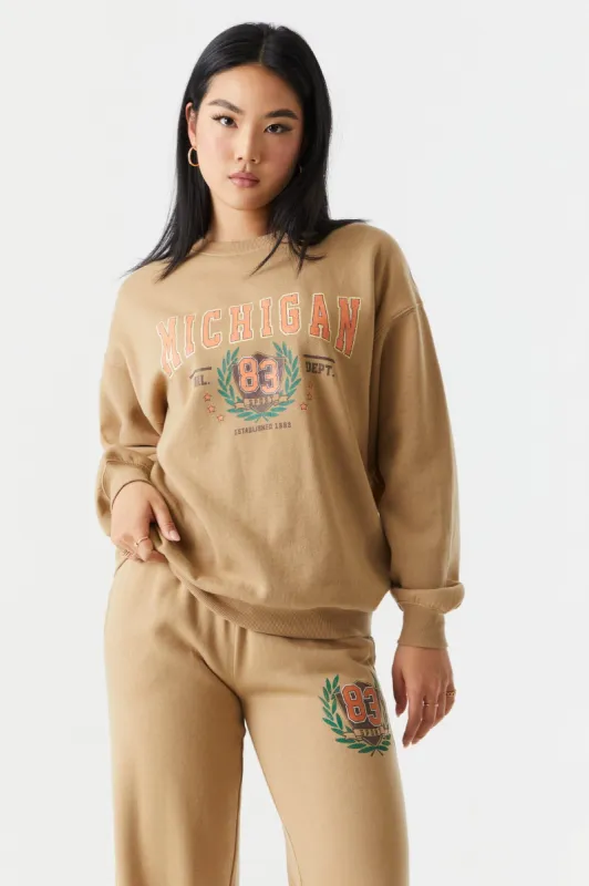 Michigan Graphic Crew Neck Boyfriend Sweatshirt sold by Charlotte Russe