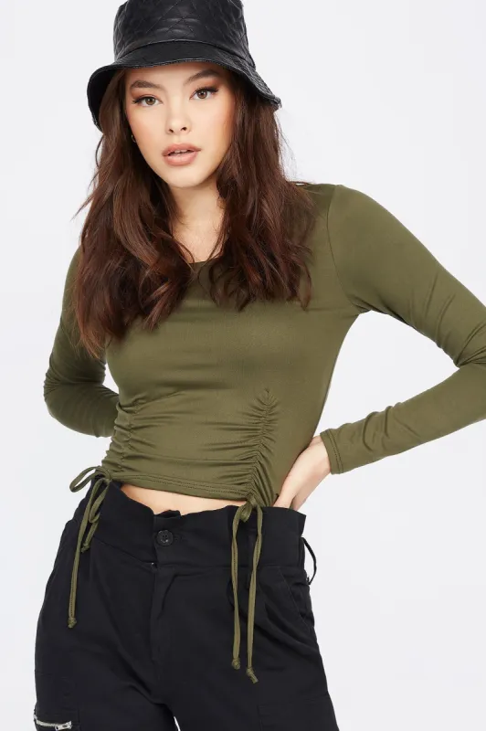 Soft Ribbed Cinched Front Long Sleeve Cropped Top sold by Charlotte Russe