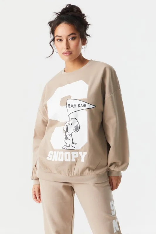 Snoopy Graphic Varsity Fleece Sweatshirt sold by Charlotte Russe