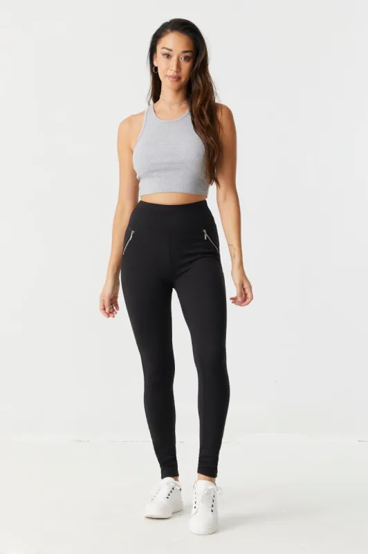 Soft High-Rise Zip-Up Pocket Legging sold by Charlotte Russe