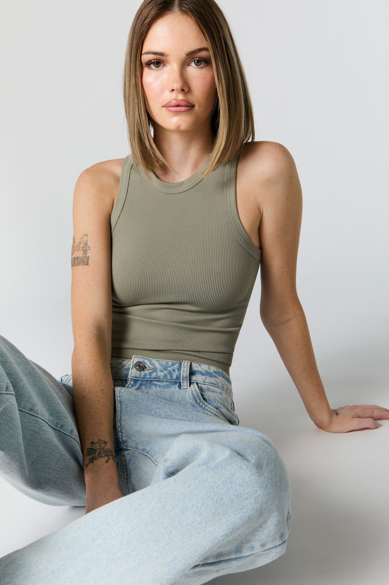 Seamless Ribbed High Neck Tank sold by Charlotte Russe