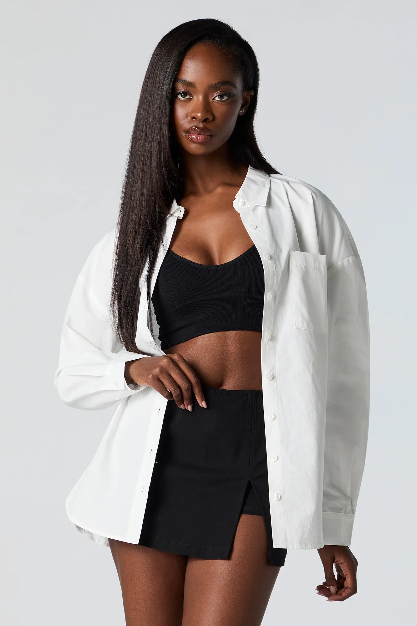 Poplin Oversized Button-Up Top sold by Charlotte Russe