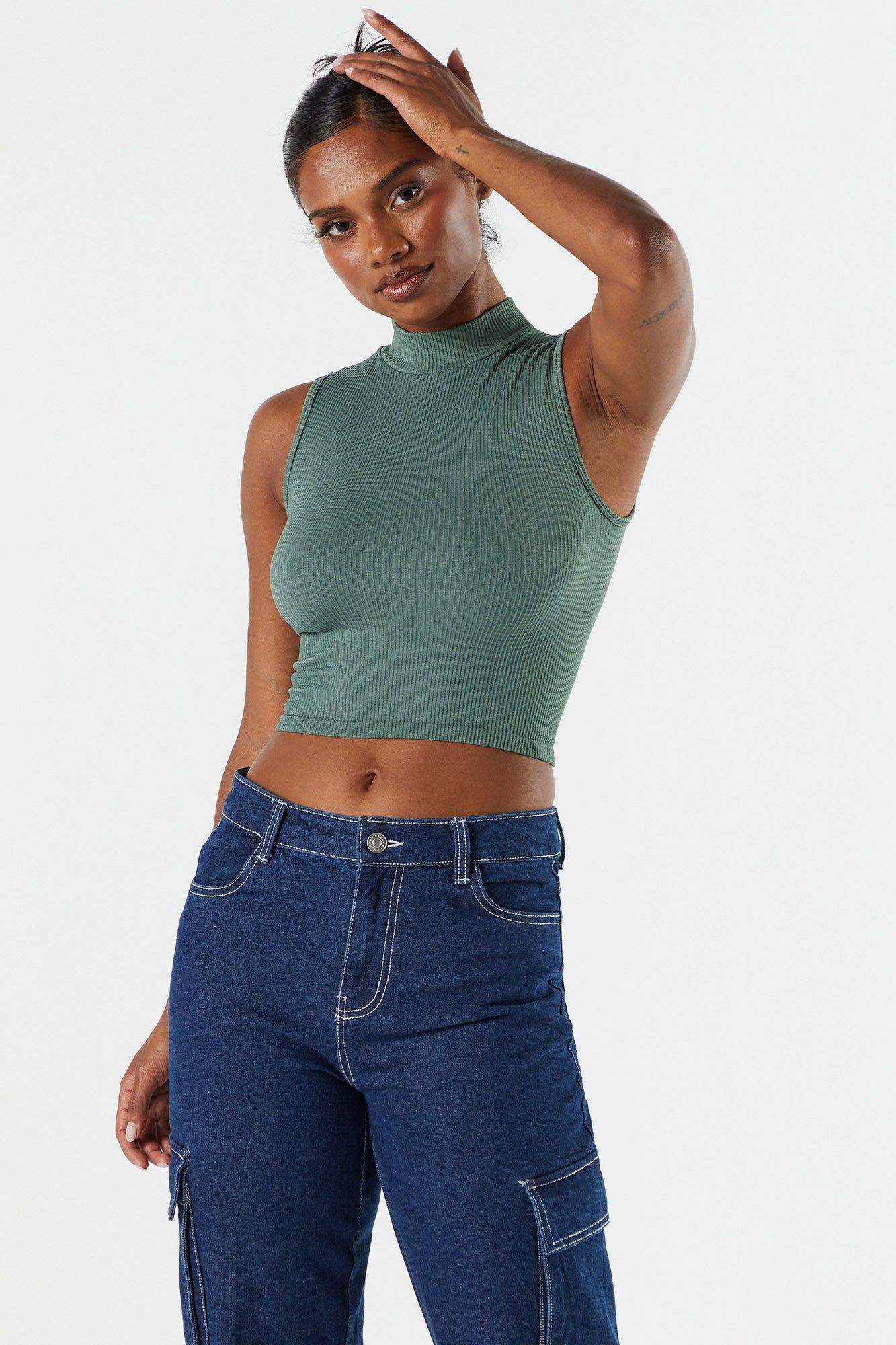 Seamless Ribbed Mock Neck Skimmer Tank sold by Charlotte Russe