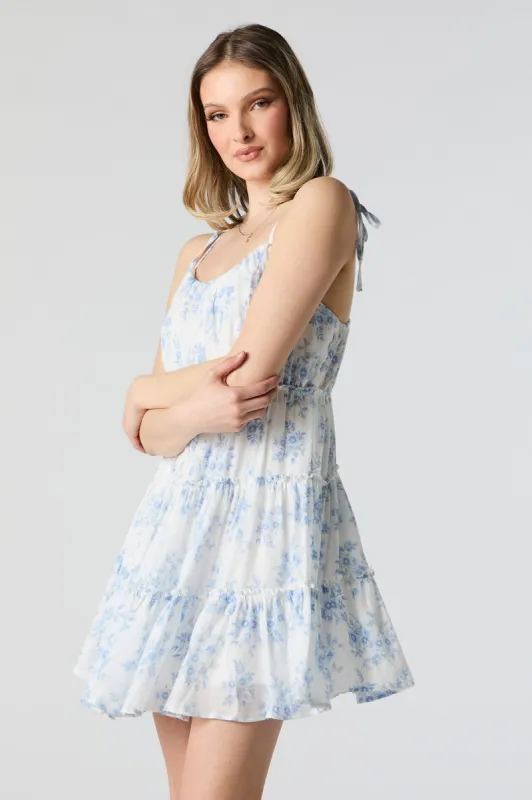 Blue Floral Tiered Tie Strap Mini Dress sold by Charlotte Russe