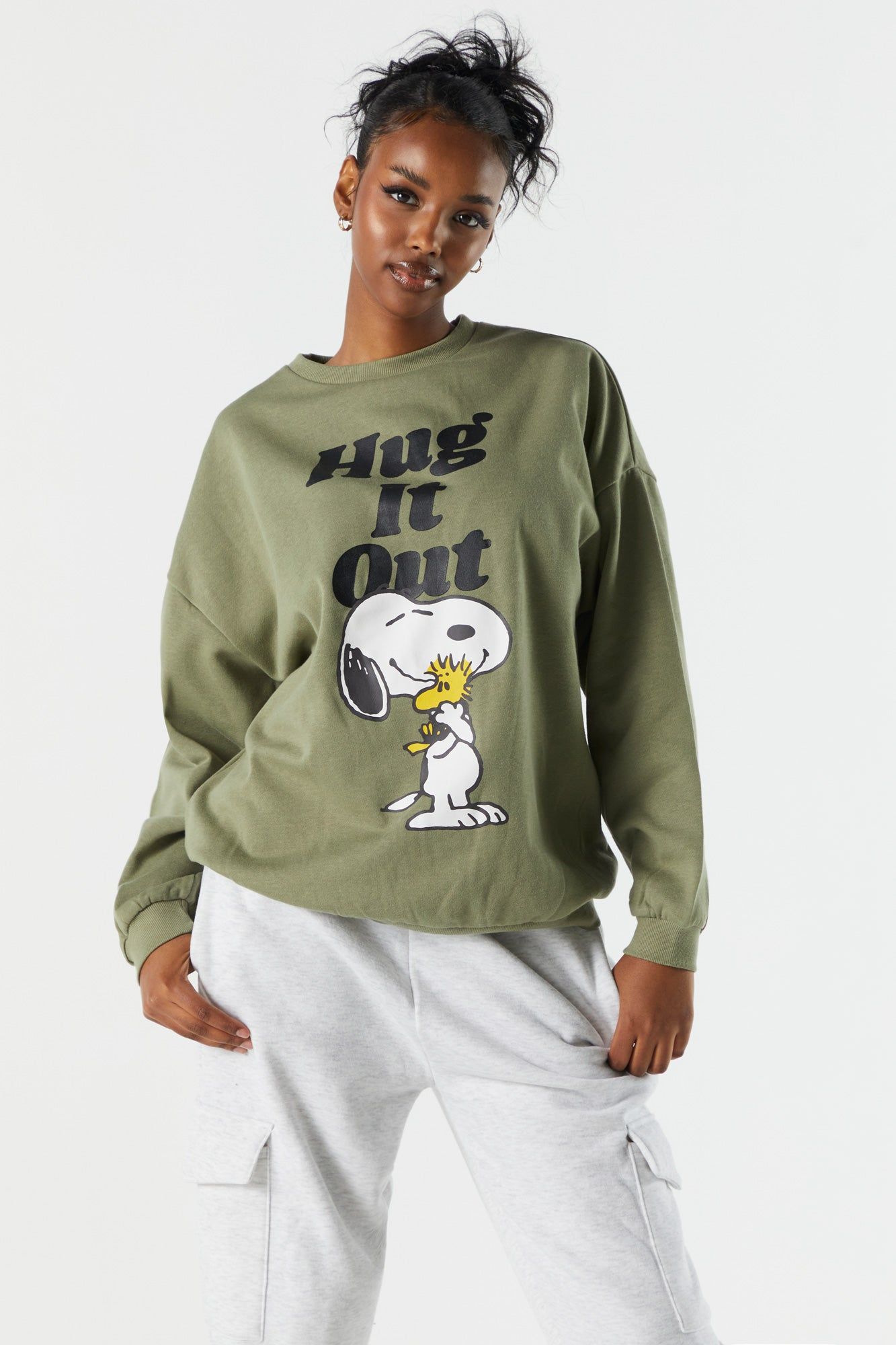 Snoopy Hug Graphic Fleece Sweatshirt sold by Charlotte Russe