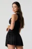 Active Pleated Tennis Skort with Pocket sold by Charlotte Russe