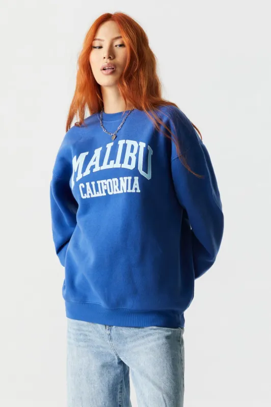 Malibu Graphic Oversized Fleece Sweatshirt sold by Charlotte Russe