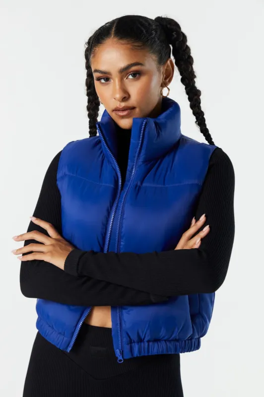 High Neck Puffer Vest sold by Charlotte Russe