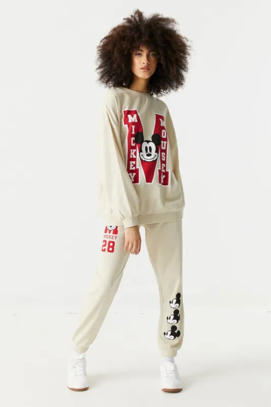 Mickey Mouse Graphic Fleece Varsity Jogger sold by Charlotte Russe