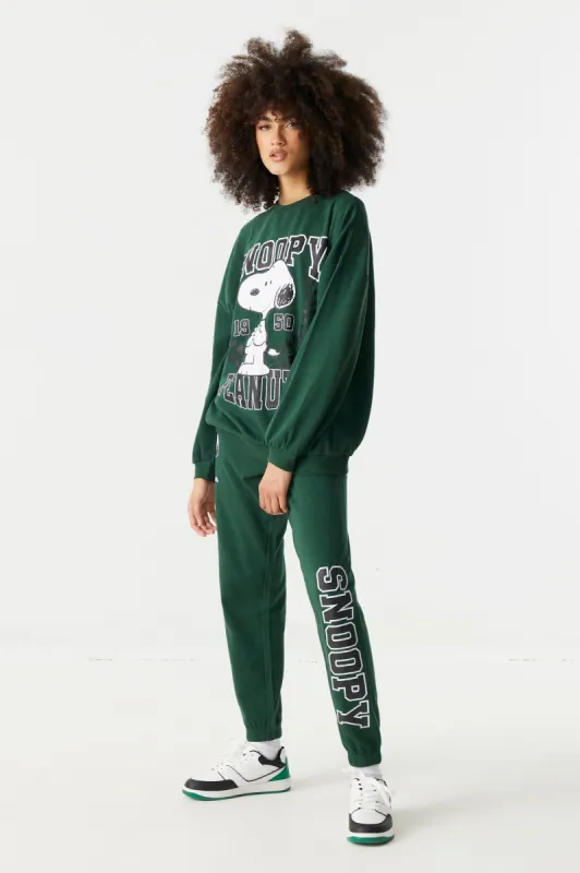 Snoopy Graphic Fleece Varsity Jogger sold by Charlotte Russe