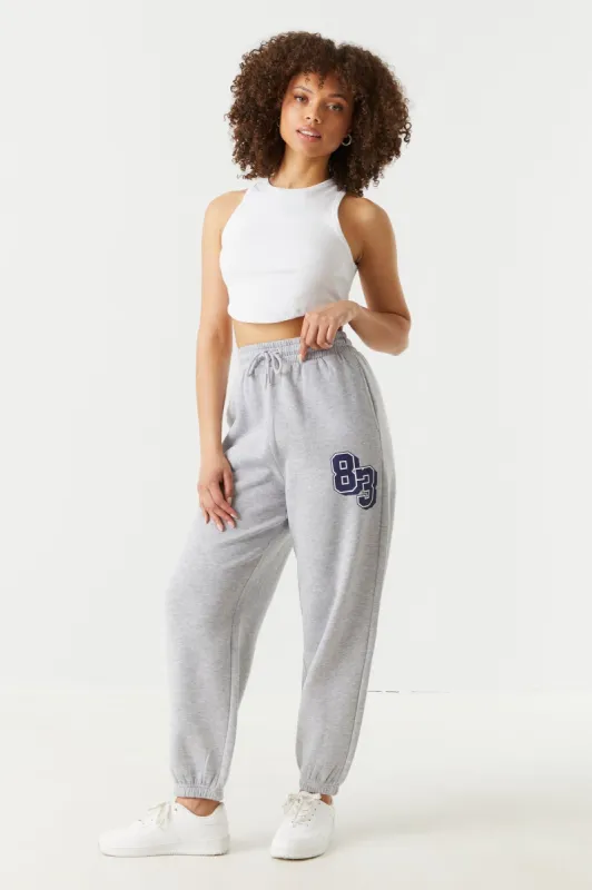 83 Graphic Fleece Jogger sold by Charlotte Russe