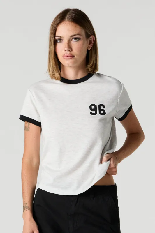 96 Graphic Sporty Ringer T-Shirt sold by Charlotte Russe