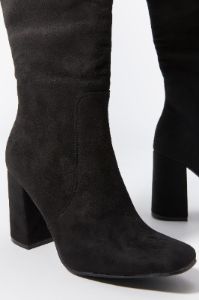 Faux Suede Knee High Heeled Boot sold by Charlotte Russe
