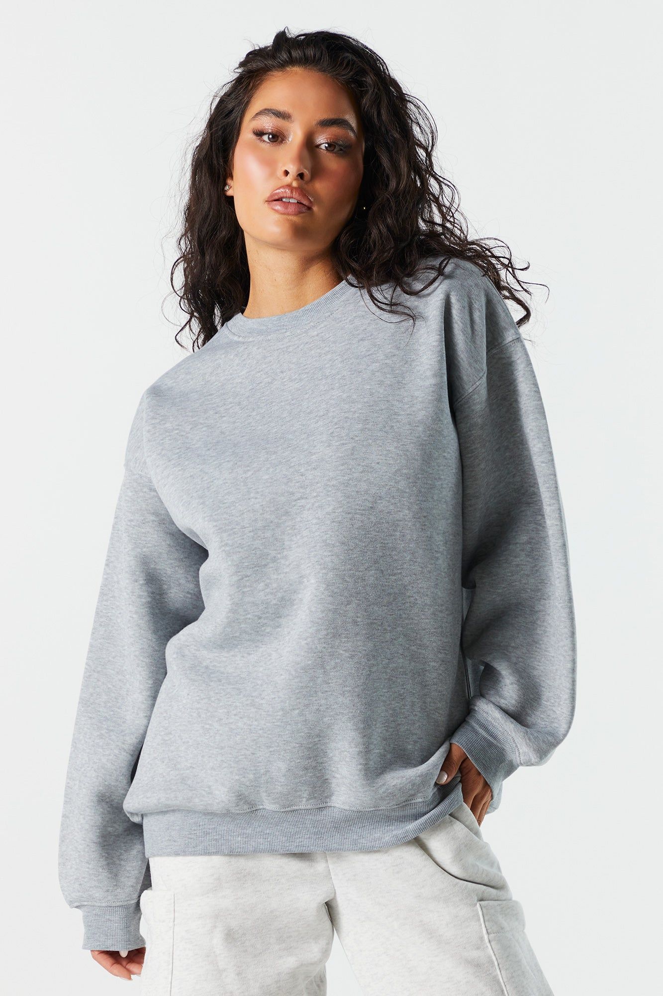 Solid Fleece Crewneck Sweatshirt sold by Charlotte Russe