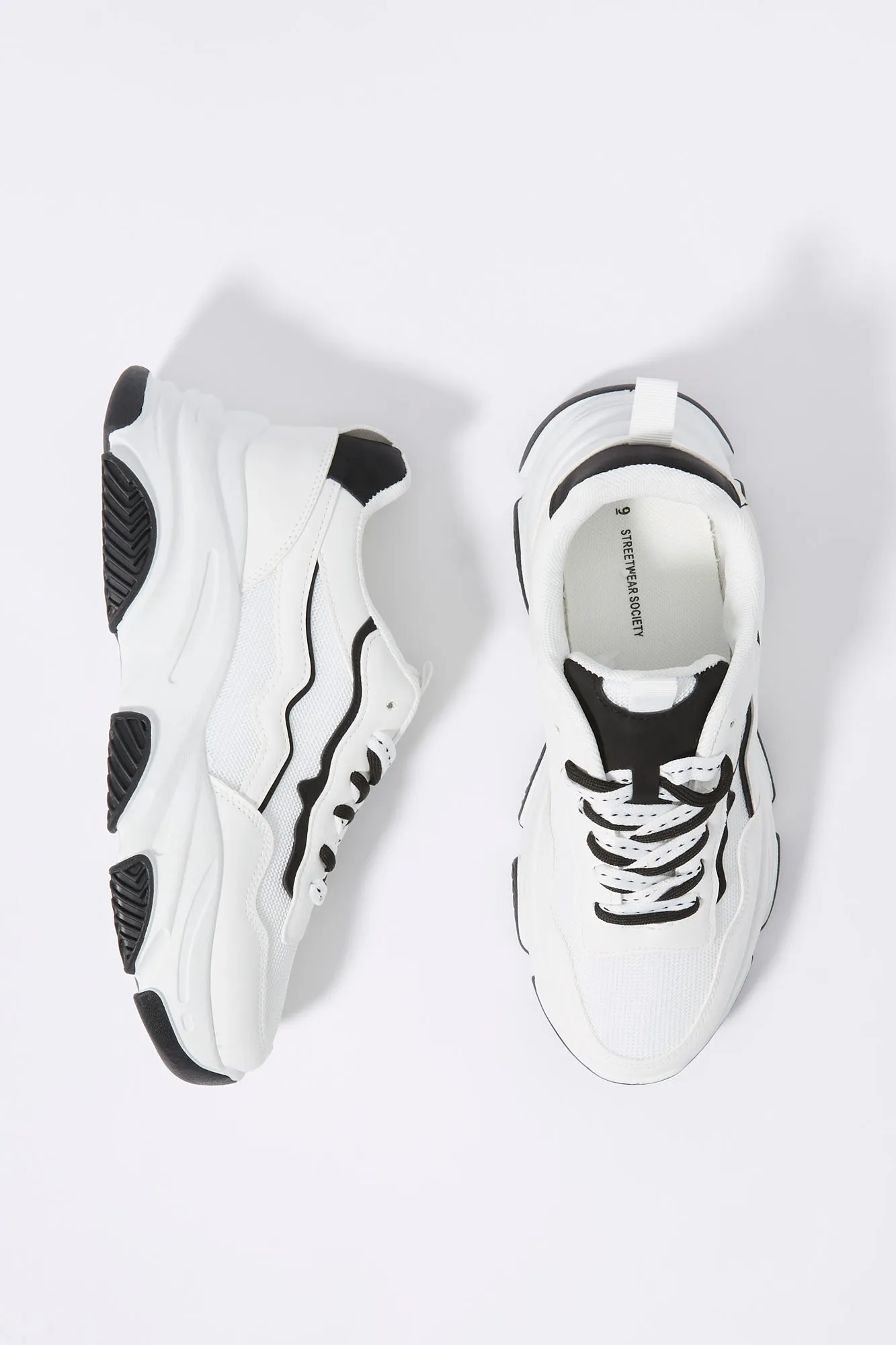 Black and White Mesh Chunky Running Shoe sold by Charlotte Russe