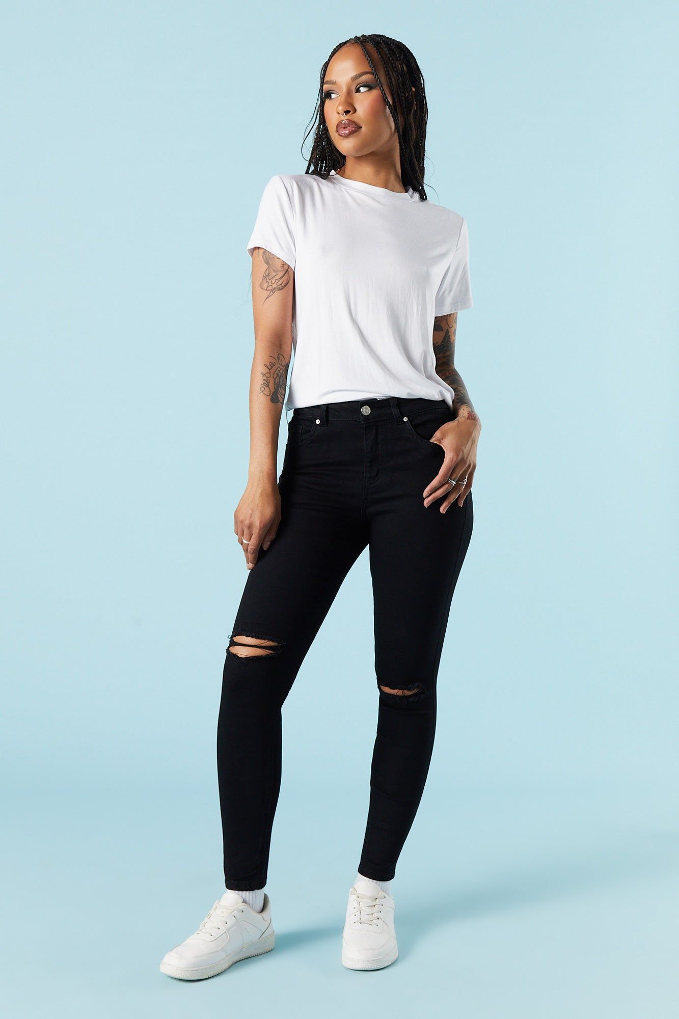 Black Wash Rio Mid Rise Distressed Skinny Jean sold by Charlotte Russe