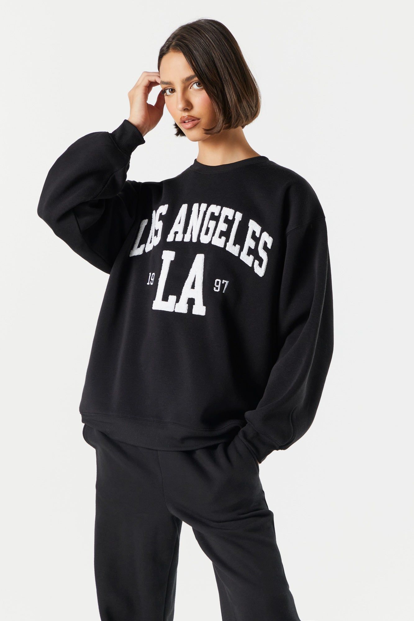 Fleece Los Angeles Graphic Sweatshirt sold by Charlotte Russe