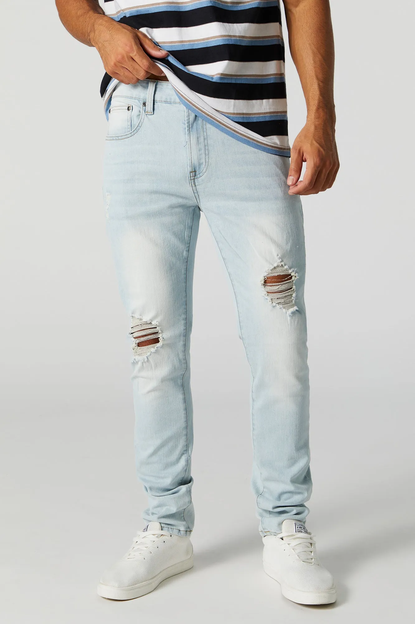 Light Wash Distressed Skinny Jean sold by Charlotte Russe