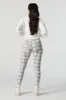 Plaid Zip Pocket Legging sold by Charlotte Russe