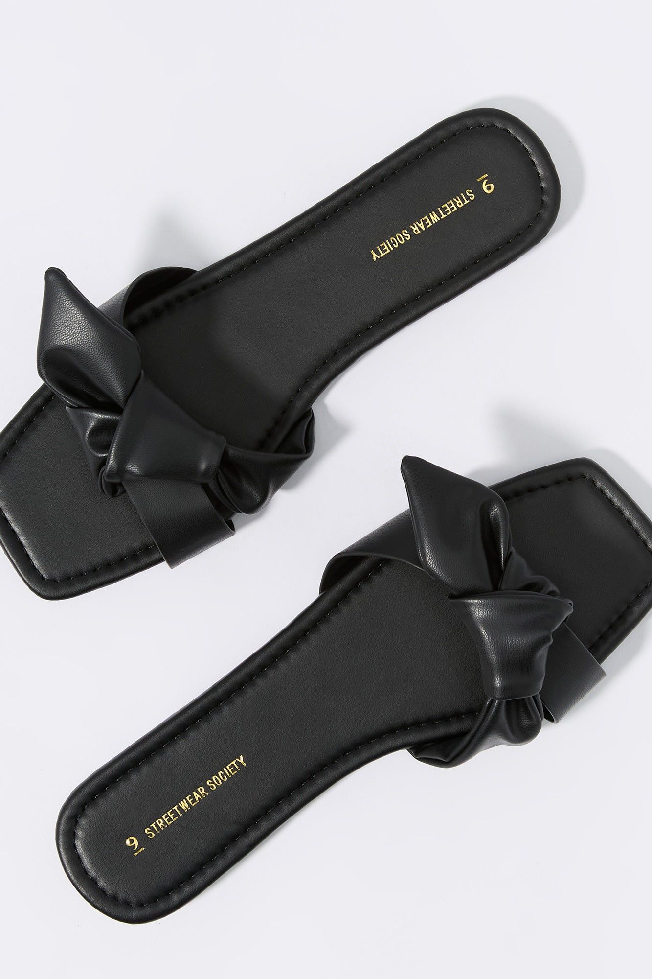 Faux Leather Knot Slide Sandal sold by Charlotte Russe